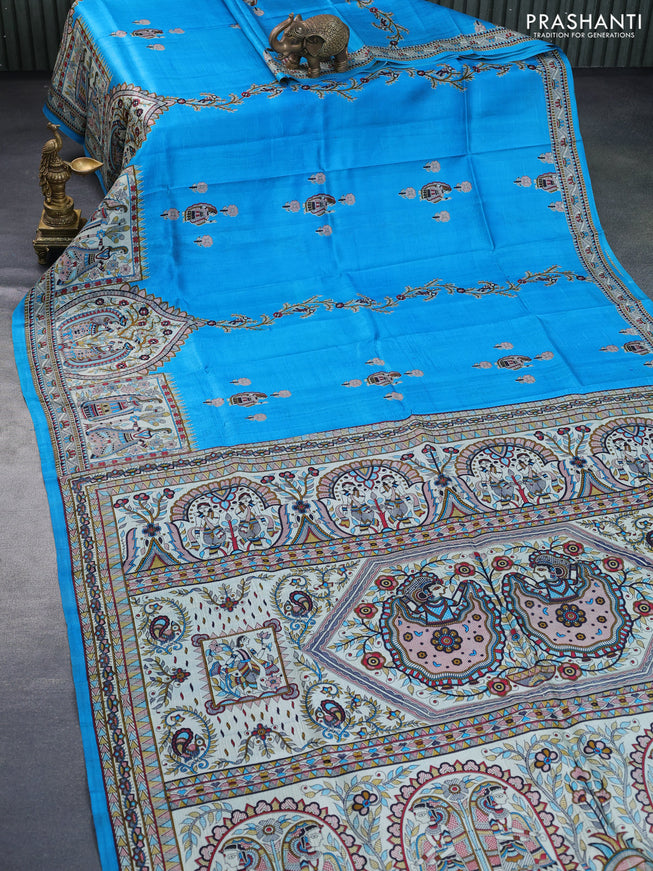 Madhubani printed silk saree cs blue and cream with allover madhubani prints & buttas and long madhubani printed border