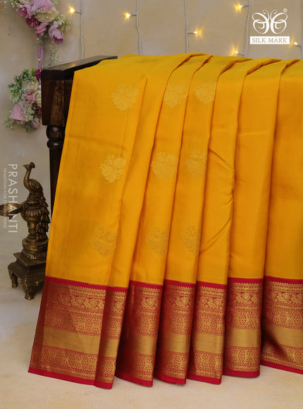 Pure kanchipuram silk saree yellow and pink with floral zari woven buttas and zari woven border