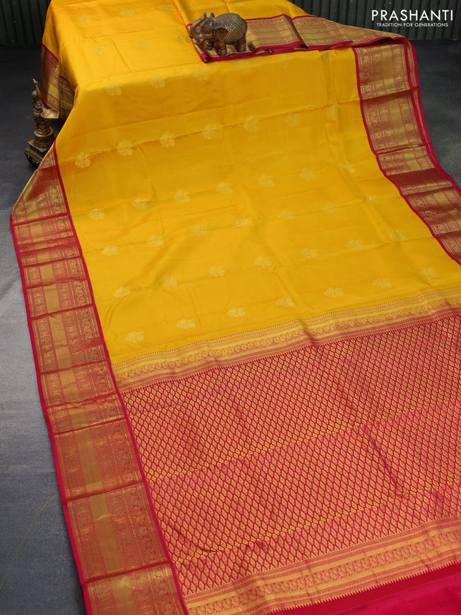 Pure kanchipuram silk saree yellow and pink with floral zari woven buttas and zari woven border