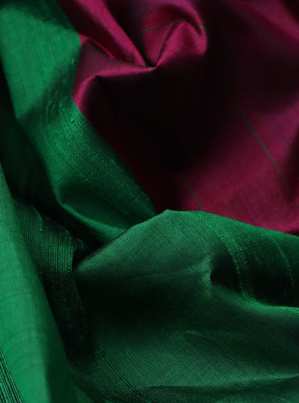 Pure soft silk saree green and dark magenta pink with plain body & jute finish and temple design border