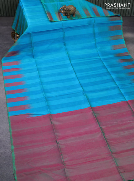 Pure soft silk saree dual shade of bluish green and dual shade of greenish pink with plain body & jute finish and temple design border