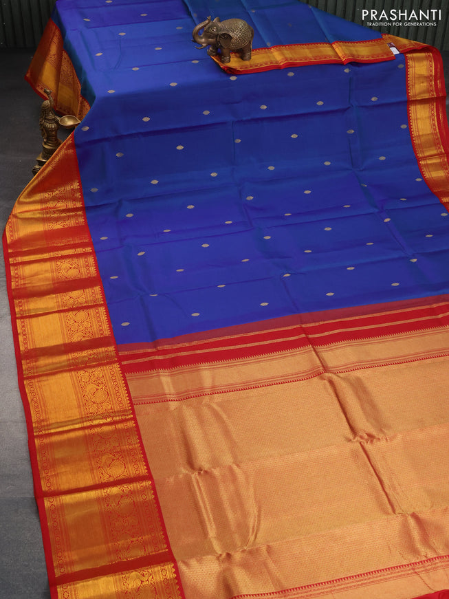 Pure kanchipuram silk saree dual shade of blue and red with zari woven buttas and long annam zari woven korvai border