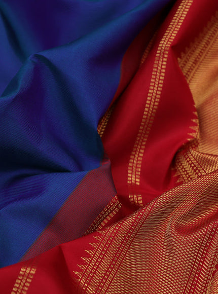 Pure kanchipuram silk saree dual shade of blue and red with zari woven buttas and long annam zari woven korvai border