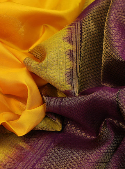 Pure kanchipuram silk saree mango yellow and deep purple with zari woven buttas and annam zari woven korvai border