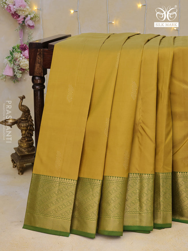 Pure kanchipuram silk saree mustard shade and green with zari woven buttas and zari woven border