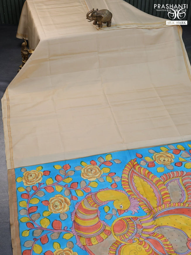 Pure soft silk saree cream and light blue with plain body and pen kalamkari hand painted pallu