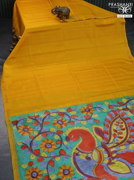 Pure soft silk saree mango yellow and teal green shade with plain body and pen kalamkari hand painted pallu