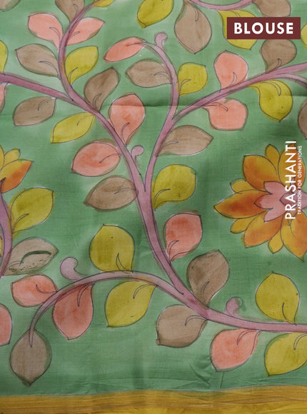 Pure soft silk saree mango yellow and pastel green with plain body and pen kalamkari hand painted pallu