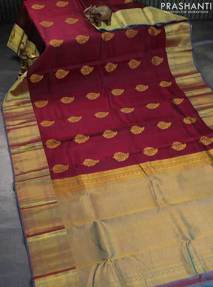 Pure kanchipuram silk saree maroon and dual shade of teal green with zari woven buttas and zari woven border