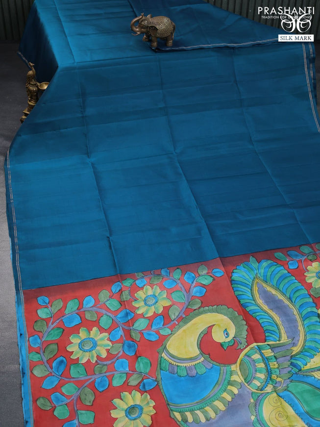 Pure soft silk saree peacock blue and rust shade with plain body and pen kalamkari hand painted pallu