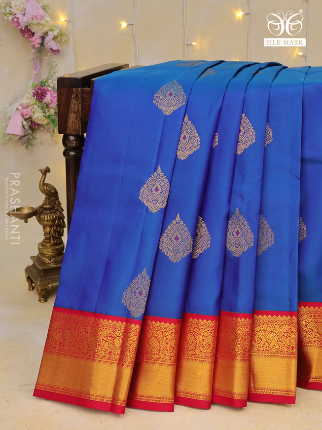 Pure kanchipuram silk saree blue and red with zari woven buttas and zari woven korvai border