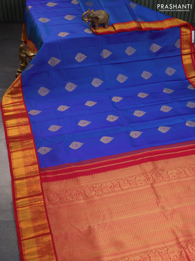 Pure kanchipuram silk saree blue and red with zari woven buttas and zari woven korvai border