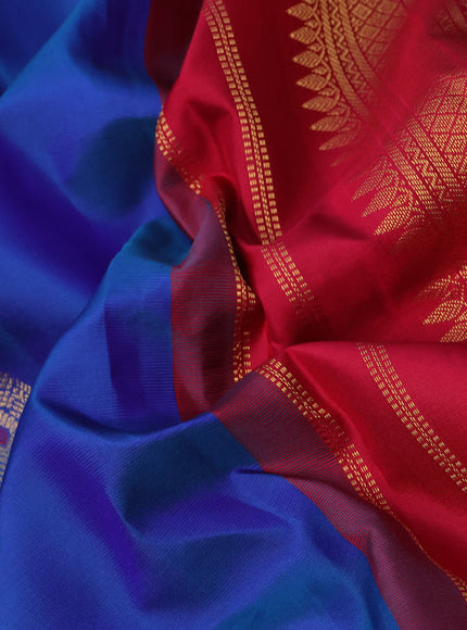 Pure kanchipuram silk saree blue and red with zari woven buttas and zari woven korvai border