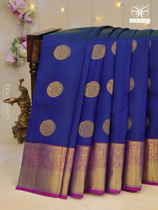 Pure kanchipuram silk saree dual shade of blue and purple with peacock zari woven buttas and annam zari woven border