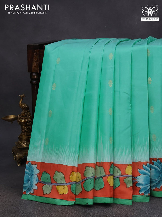 Pure soft silk saree teal green shade and orange with zari woven buttas and pen kalamkari hand painted border