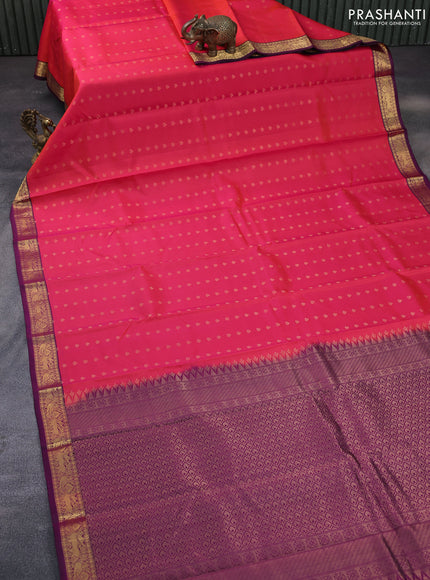 Pure soft silk saree dual shade of pinkish orange and purple with allover zari woven buttas and zari woven border