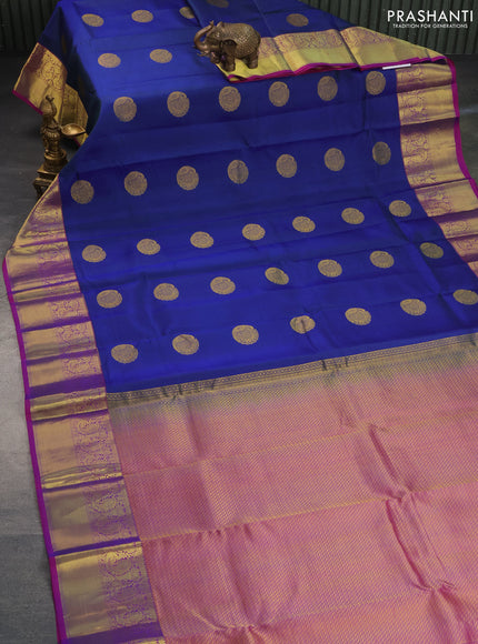 Pure kanchipuram silk saree dual shade of blue and purple with peacock zari woven buttas and annam zari woven border