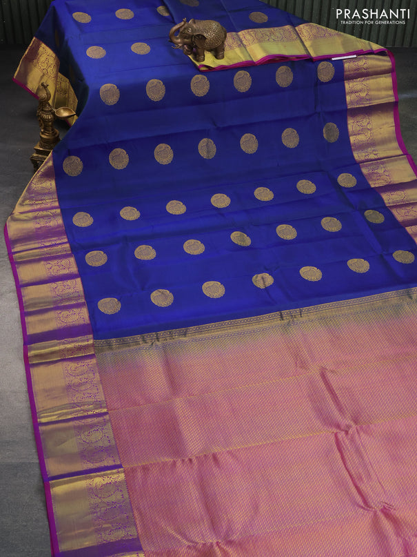 Pure kanchipuram silk saree dual shade of blue and purple with peacock zari woven buttas and annam zari woven border