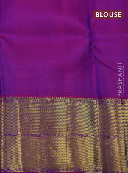 Pure kanchipuram silk saree dual shade of blue and purple with peacock zari woven buttas and annam zari woven border