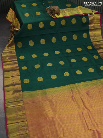 Pure kanchipuram silk saree green and magenta pink with peacock zari woven buttas and annam zari woven border