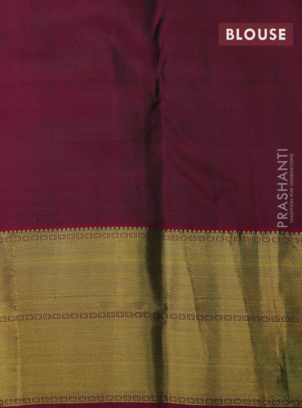 Pure kanchipuram silk saree green and magenta pink with peacock zari woven buttas and annam zari woven border