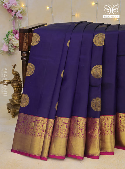 Pure kanchipuram silk saree dark blue and purple with peacock zari woven buttas and annam zari woven border