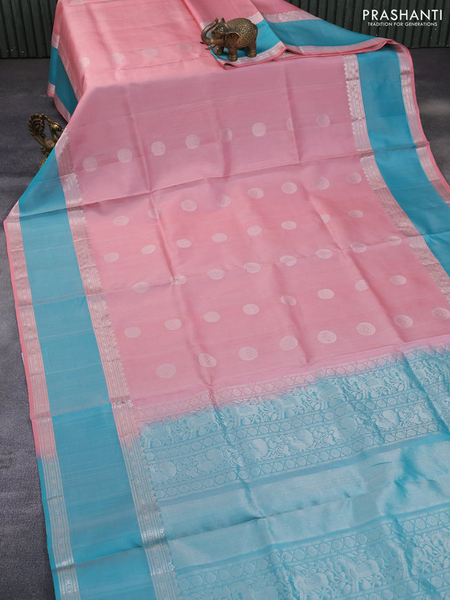 Pure soft silk saree peach pink and teal blue with silver zari woven buttas and rettapet silver zari woven border