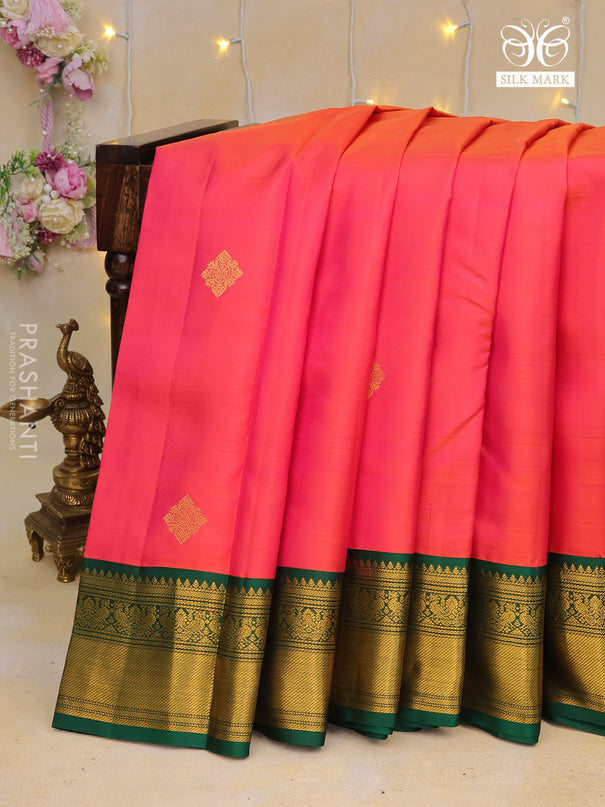 Pure kanchipuram silk saree dual shade of pinkish orange and green with zari woven buttas and zari woven korvai border