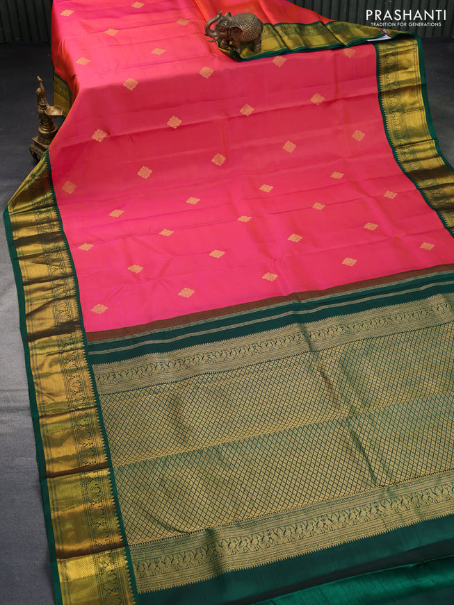 Pure kanchipuram silk saree dual shade of pinkish orange and green with zari woven buttas and zari woven korvai border