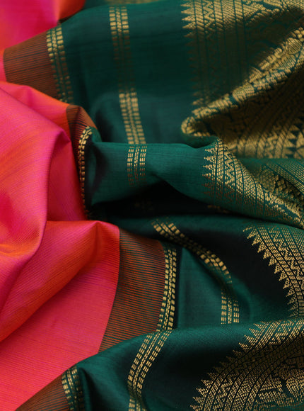 Pure kanchipuram silk saree dual shade of pinkish orange and green with zari woven buttas and zari woven korvai border