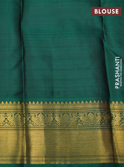 Pure kanchipuram silk saree dual shade of pinkish orange and green with zari woven buttas and zari woven korvai border