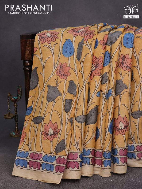 Tussar silk saree mustard shade and beige with allover hand painted pen kalamkari prints and printed border