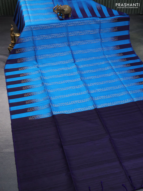 Pure soft silk saree cs blue and dark blue with allover zari weaves & jute finish and temple design border