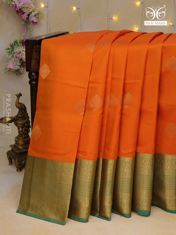 Pure kanchipuram silk saree orange and dual shade of teal blue with zari woven buttas and zari woven border