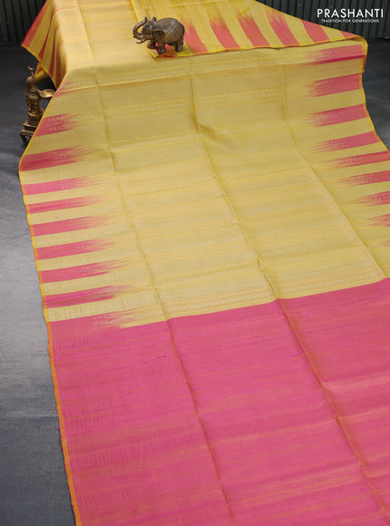 Pure soft silk saree yellow and dual shade of pinkish yellow with allover zari weaves & jute finish and temple design border