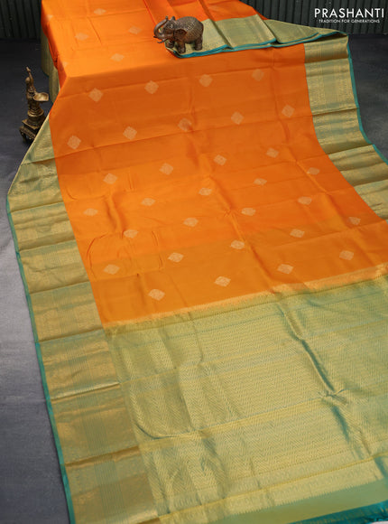 Pure kanchipuram silk saree orange and dual shade of teal blue with zari woven buttas and zari woven border