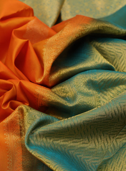 Pure kanchipuram silk saree orange and dual shade of teal blue with zari woven buttas and zari woven border