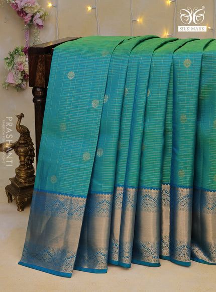 Pure kanchipuram silk saree dual shade of teal bluish green with allover zari weaves & buttas and zari woven border