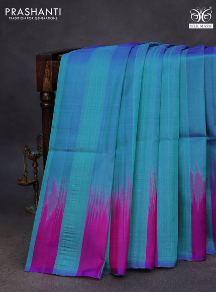 Pure soft silk saree dual shade of teal green and purple with plain body & jute finish and temple design border