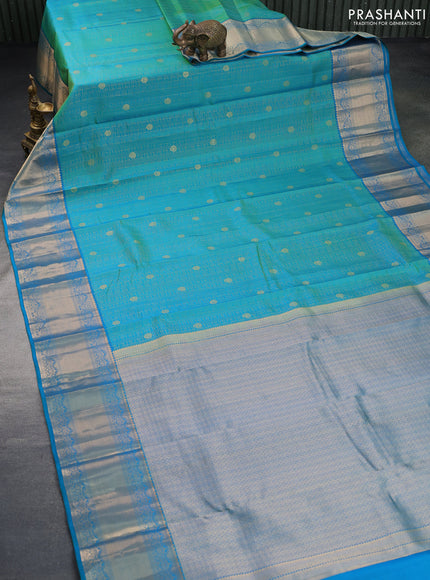 Pure kanchipuram silk saree dual shade of teal bluish green with allover zari weaves & buttas and zari woven border