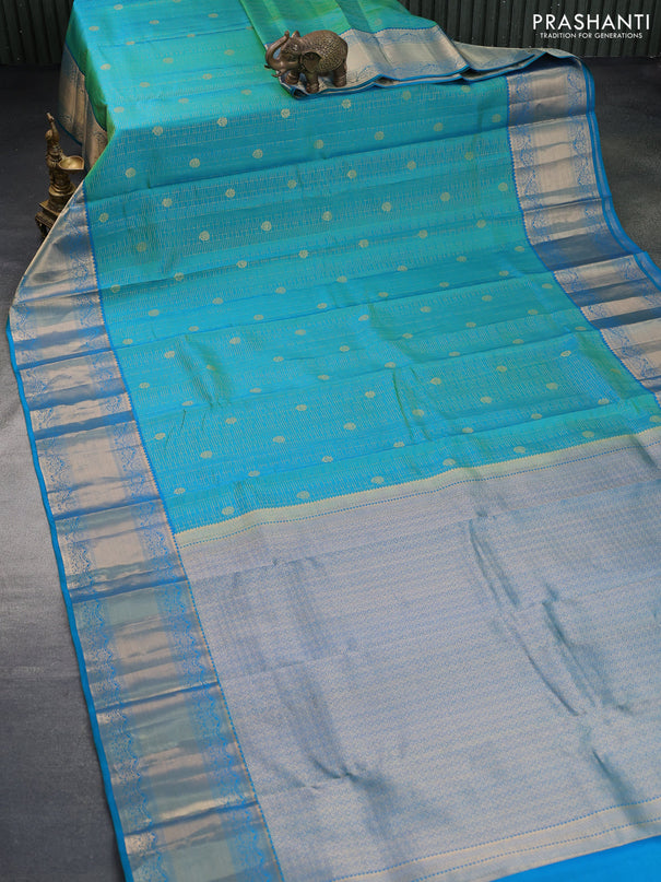 Pure kanchipuram silk saree dual shade of teal bluish green with allover zari weaves & buttas and zari woven border