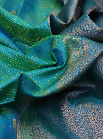 Pure kanchipuram silk saree dual shade of teal bluish green with allover zari weaves & buttas and zari woven border