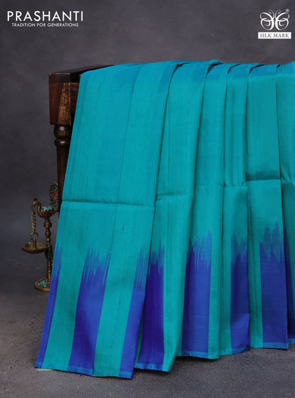 Pure soft silk saree teal green and blue with plain body & jute finish and temple design border