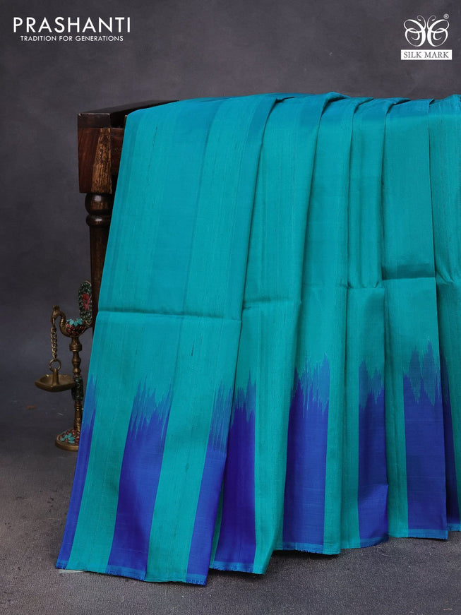 Pure soft silk saree teal green and blue with plain body & jute finish and temple design border