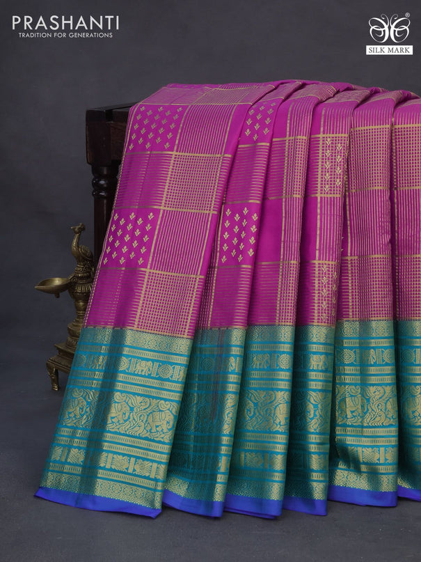 Pure gadwal silk saree purple and teal blue with allover zari weaves and long zari woven border