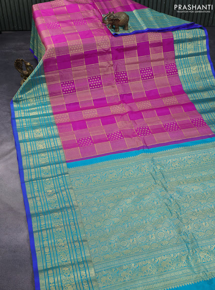 Pure gadwal silk saree purple and teal blue with allover zari weaves and long zari woven border