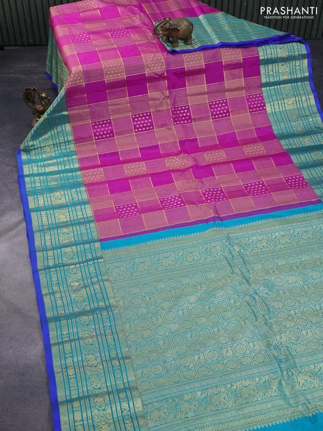 Pure gadwal silk saree purple and teal blue with allover zari weaves and long zari woven border