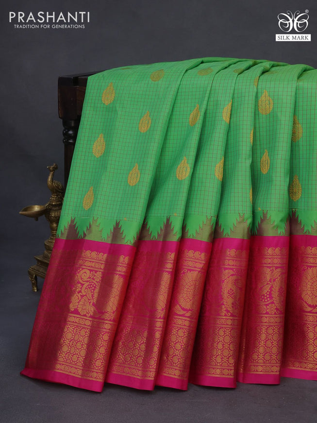 Pure gadwal silk saree light green and pink with allover zari checked pattern & zari buttas and long zari woven border