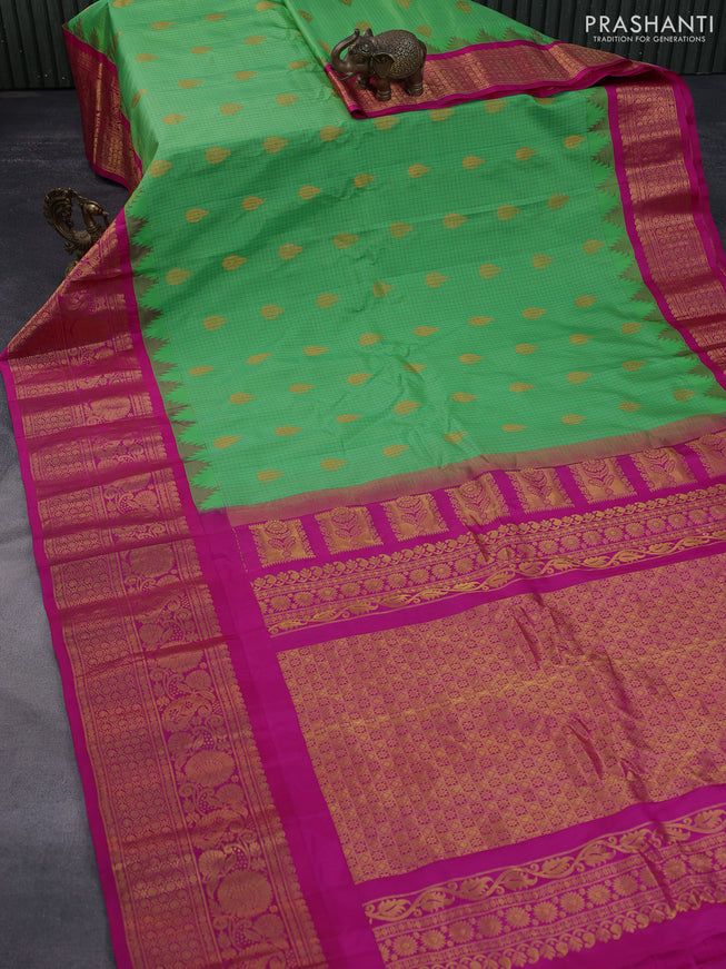 Pure gadwal silk saree light green and pink with allover zari checked pattern & zari buttas and long zari woven border