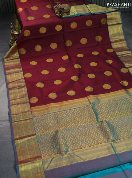 Pure kanchipuram silk saree maroon and peacock green with zari woven buttas and zari woven border